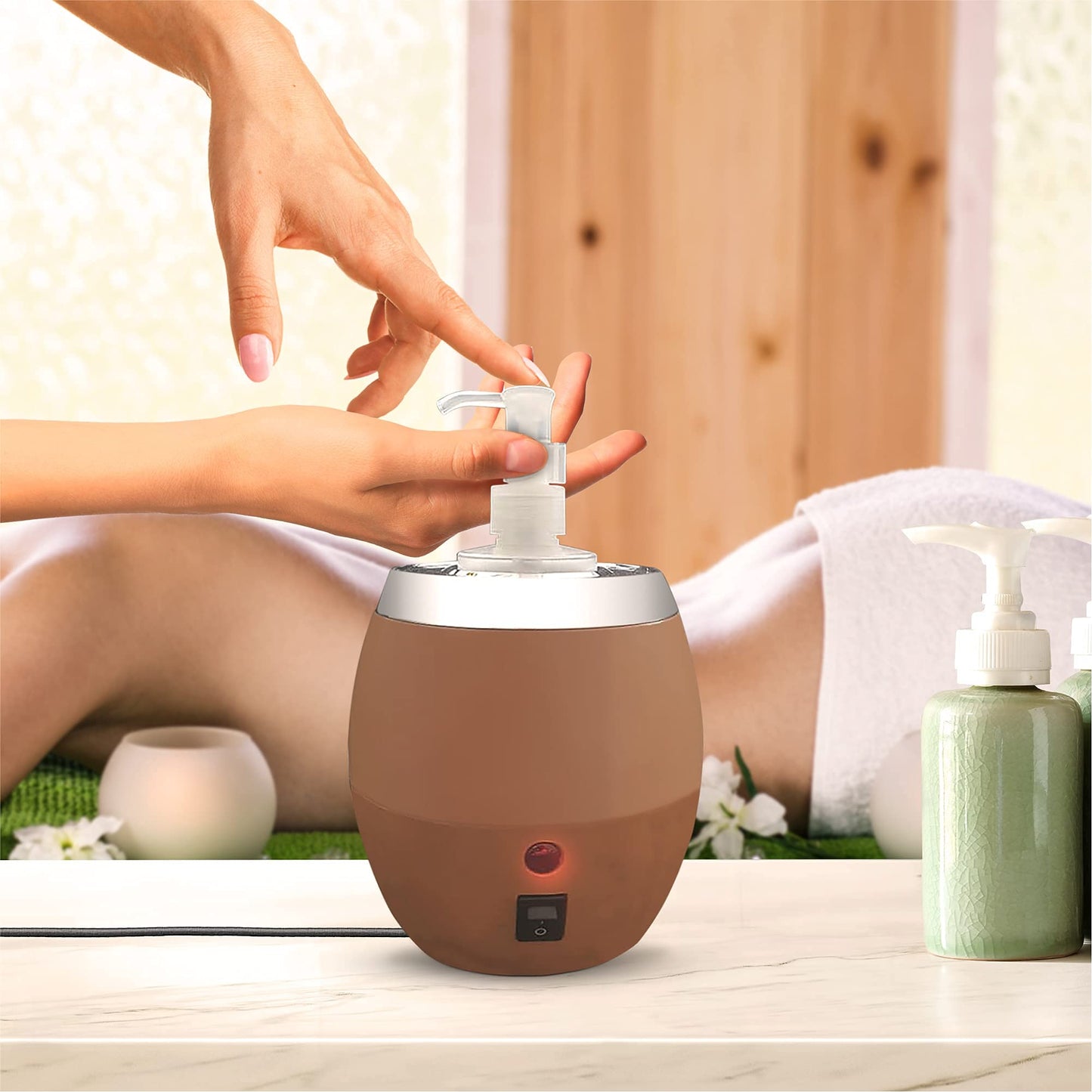 Hand applying lotion to a brown bottle with a blurred background